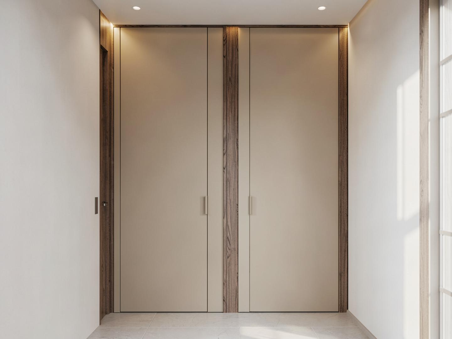 Visualisierung einer Garderobe mit beigen Fronten und Nussbaumdetail